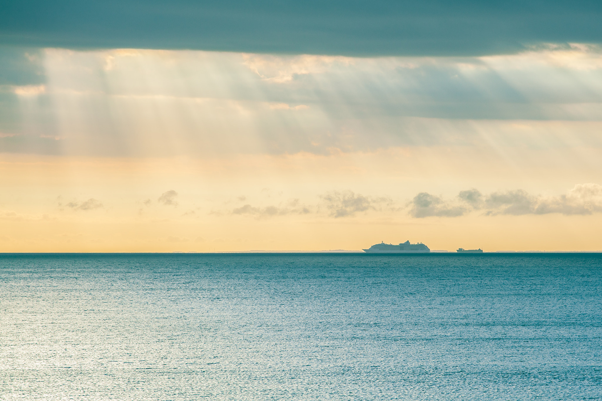 Large ship sailing across the water strip