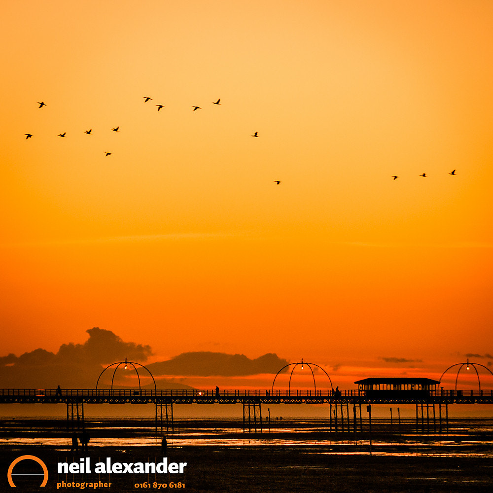 Southport pier at sunset, Lancashire, England, UK
