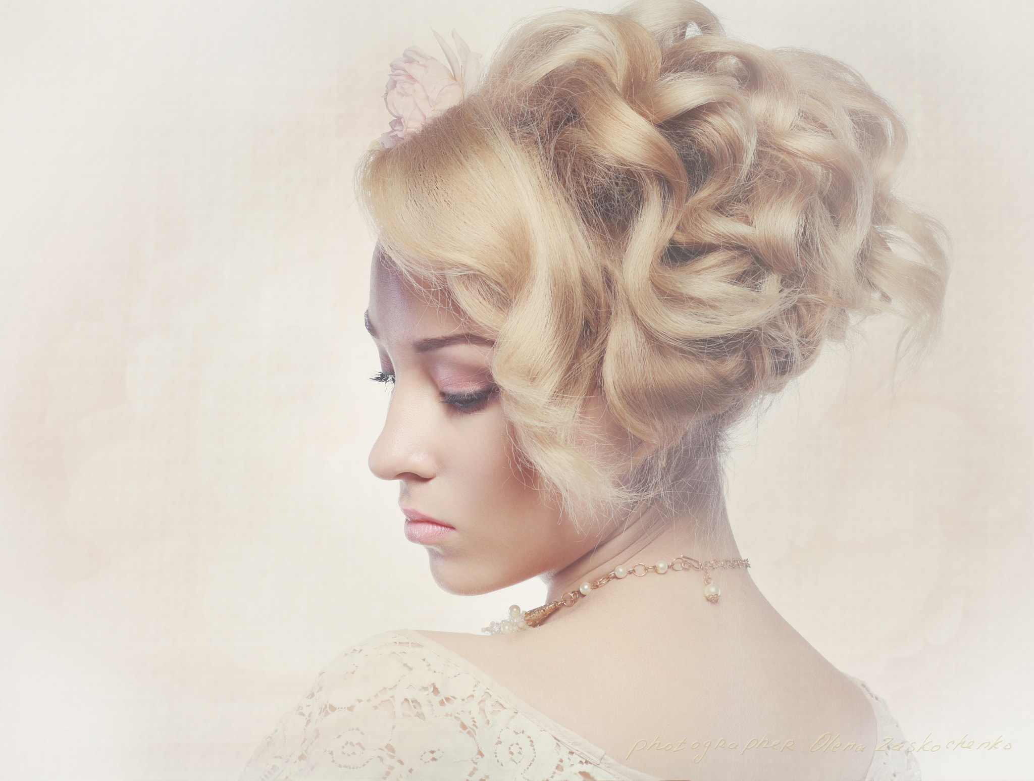 woman with roses in hair vintage