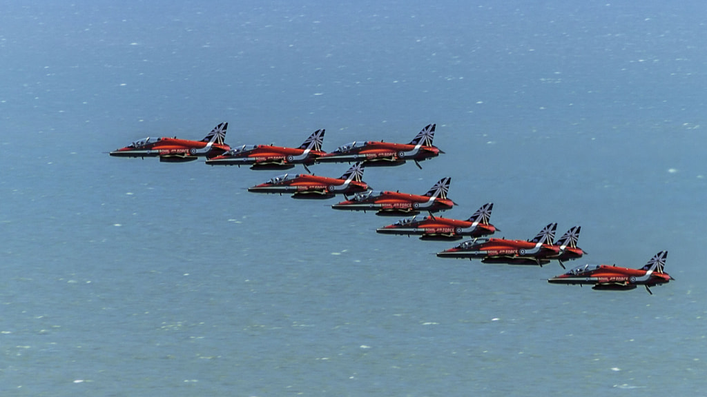 RAF Red Arrows over the sea at Eastbourne by Kev Handley on 500px.com