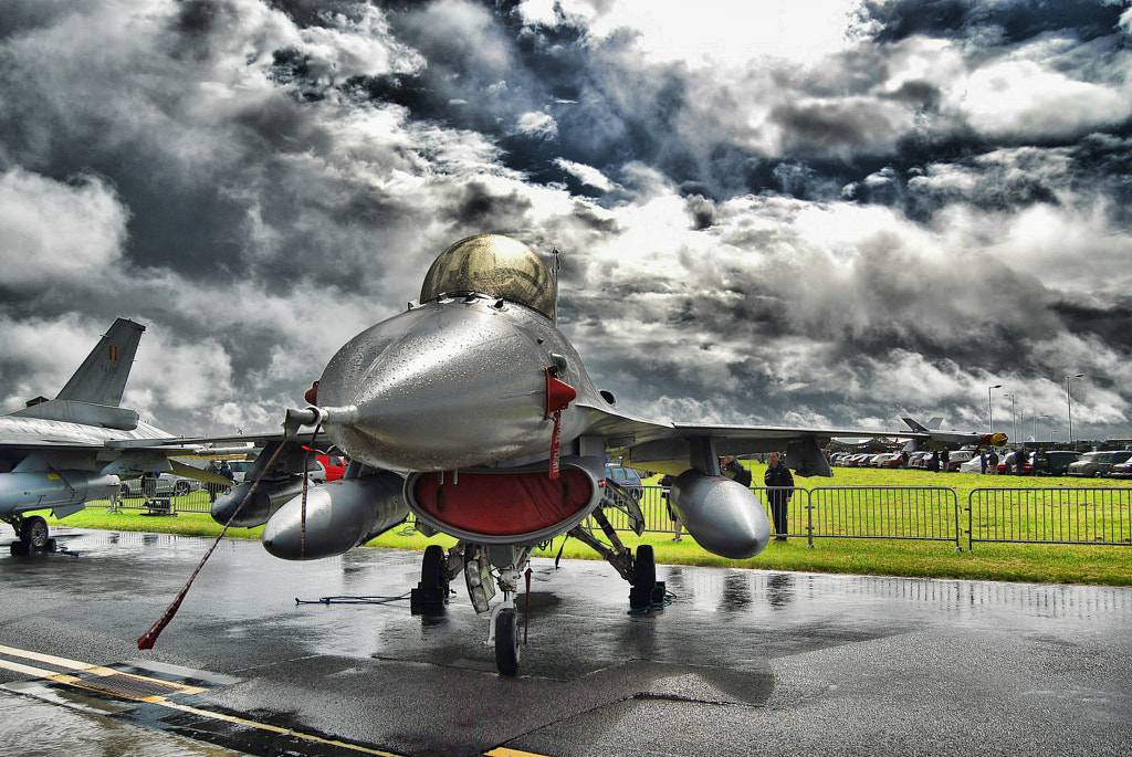 F-16 sitting under the storm by James Lucas on 500px.com