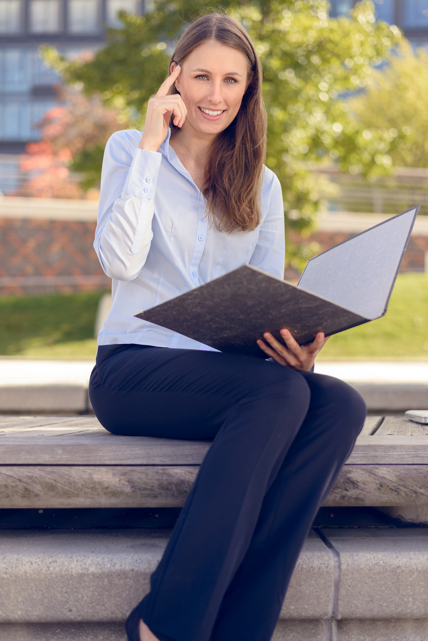 Attractive businesswoman having an idea