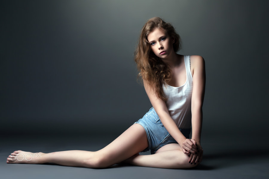 Skinny Young Model Posing In Studio On Gray Backdrop By Andrey