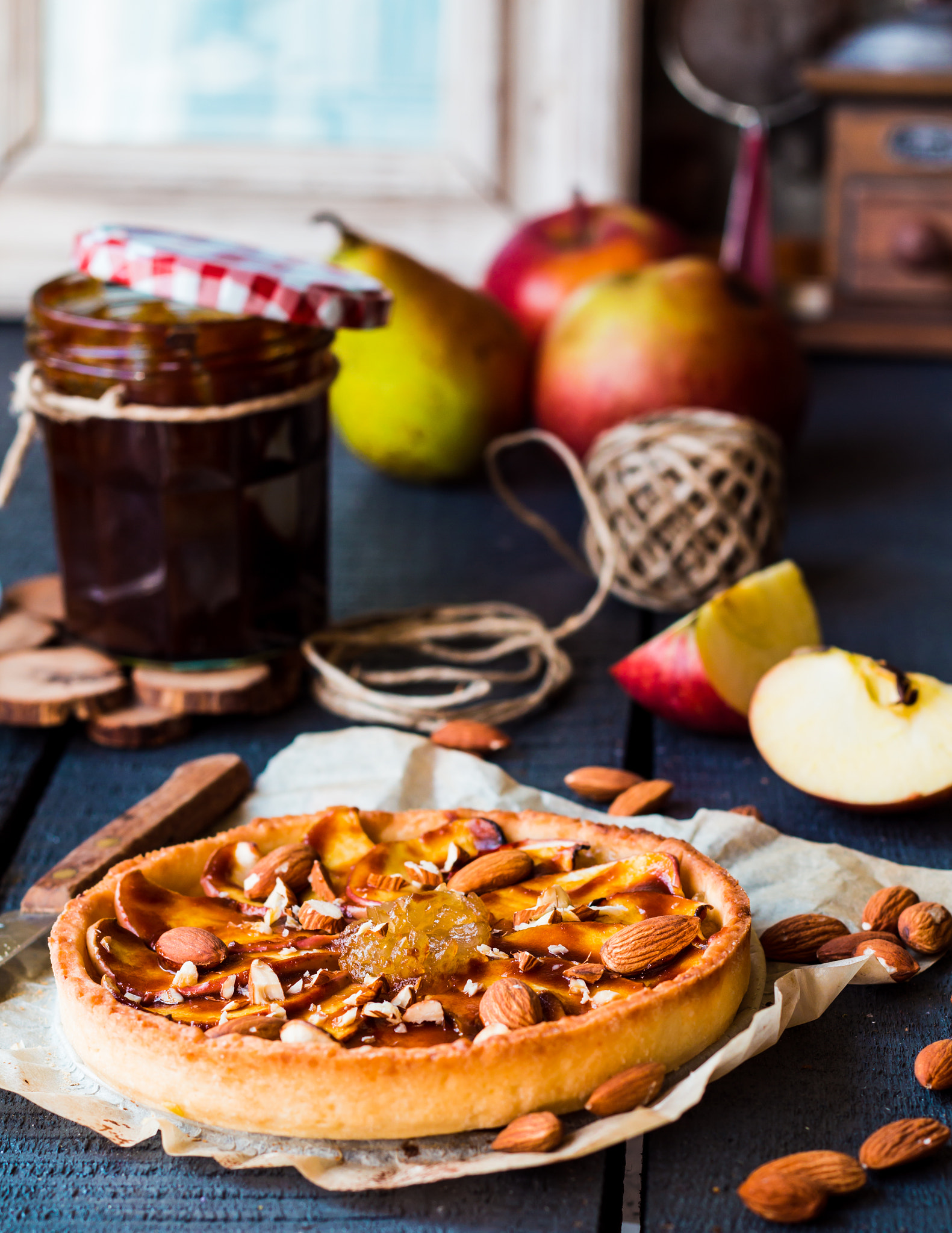 apple tart on a sand base with pear jam and caramel