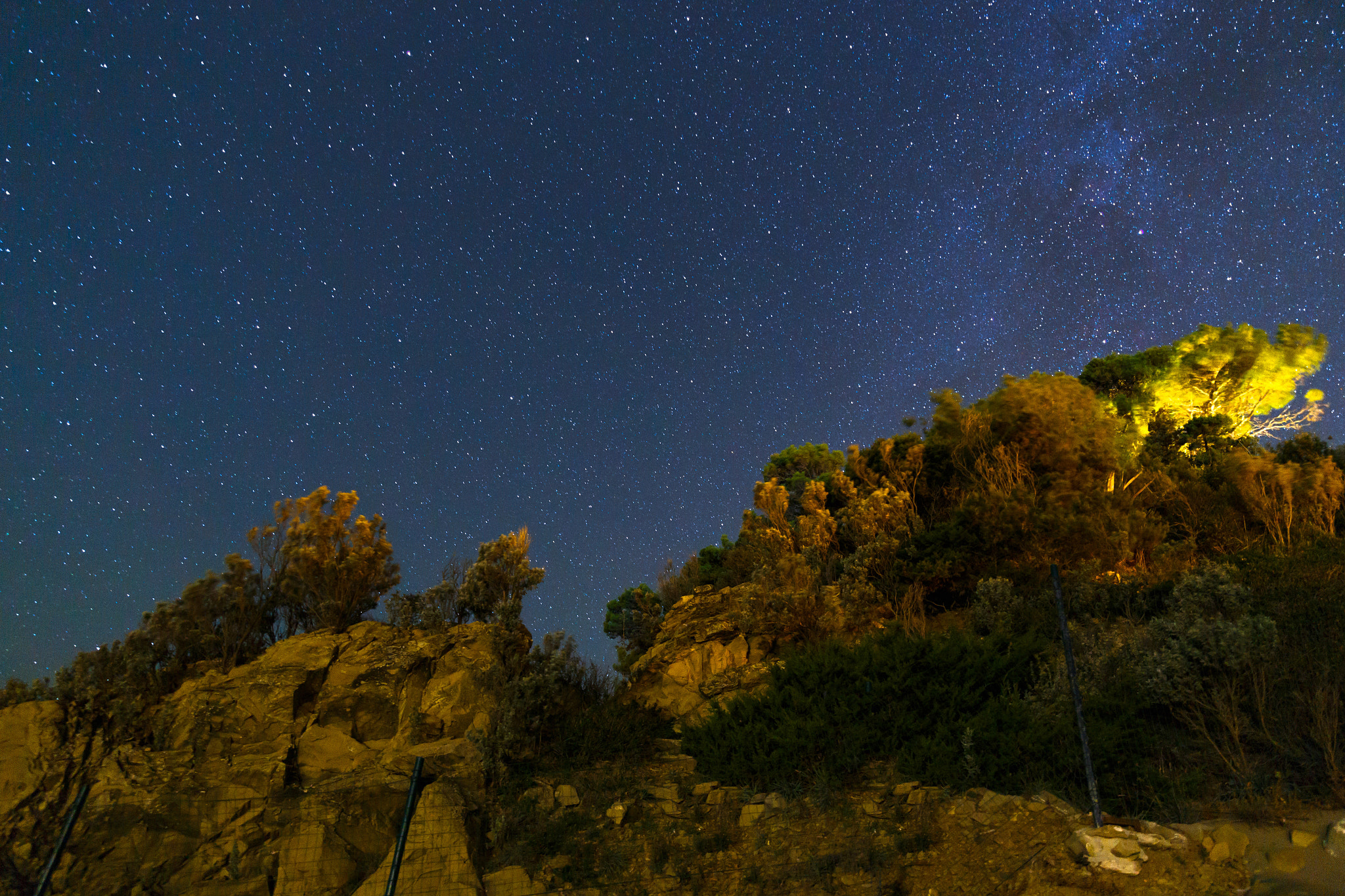 Cape Capezzòlo under a starry night