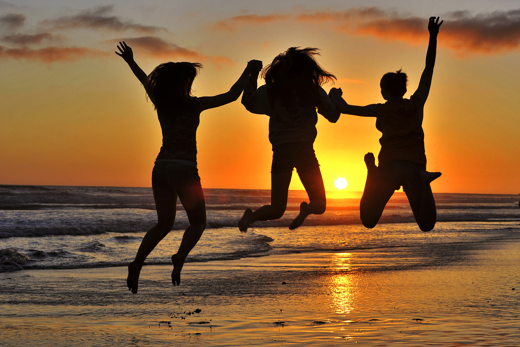 Three Girls Jumping at Sunset in Oceanside. by Rich Cruse - Photo ...