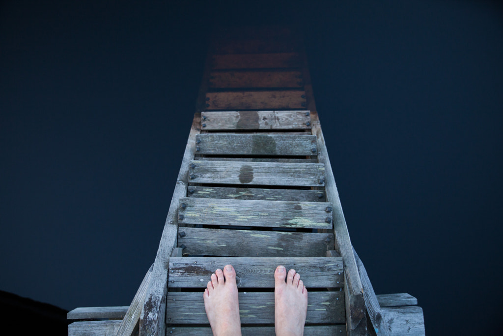 Standing on a pier by Miikka Poutiainen on 500px.com