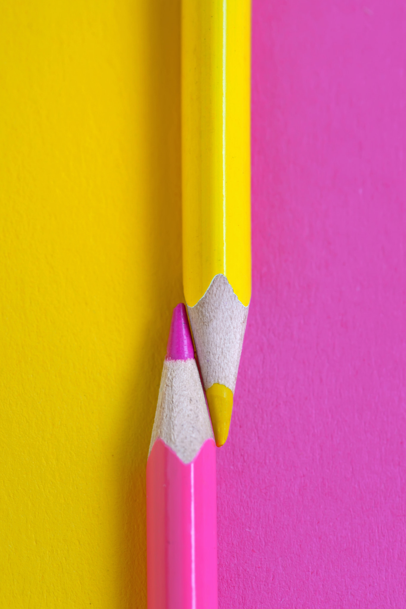 yellow and pink crayons