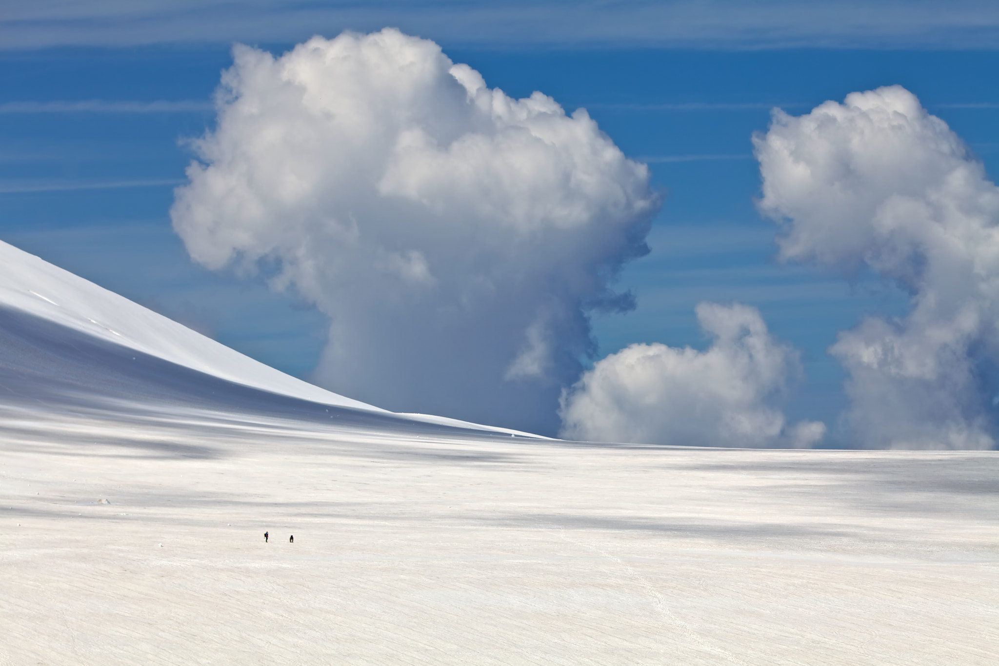 Clouds over the snowy mountain