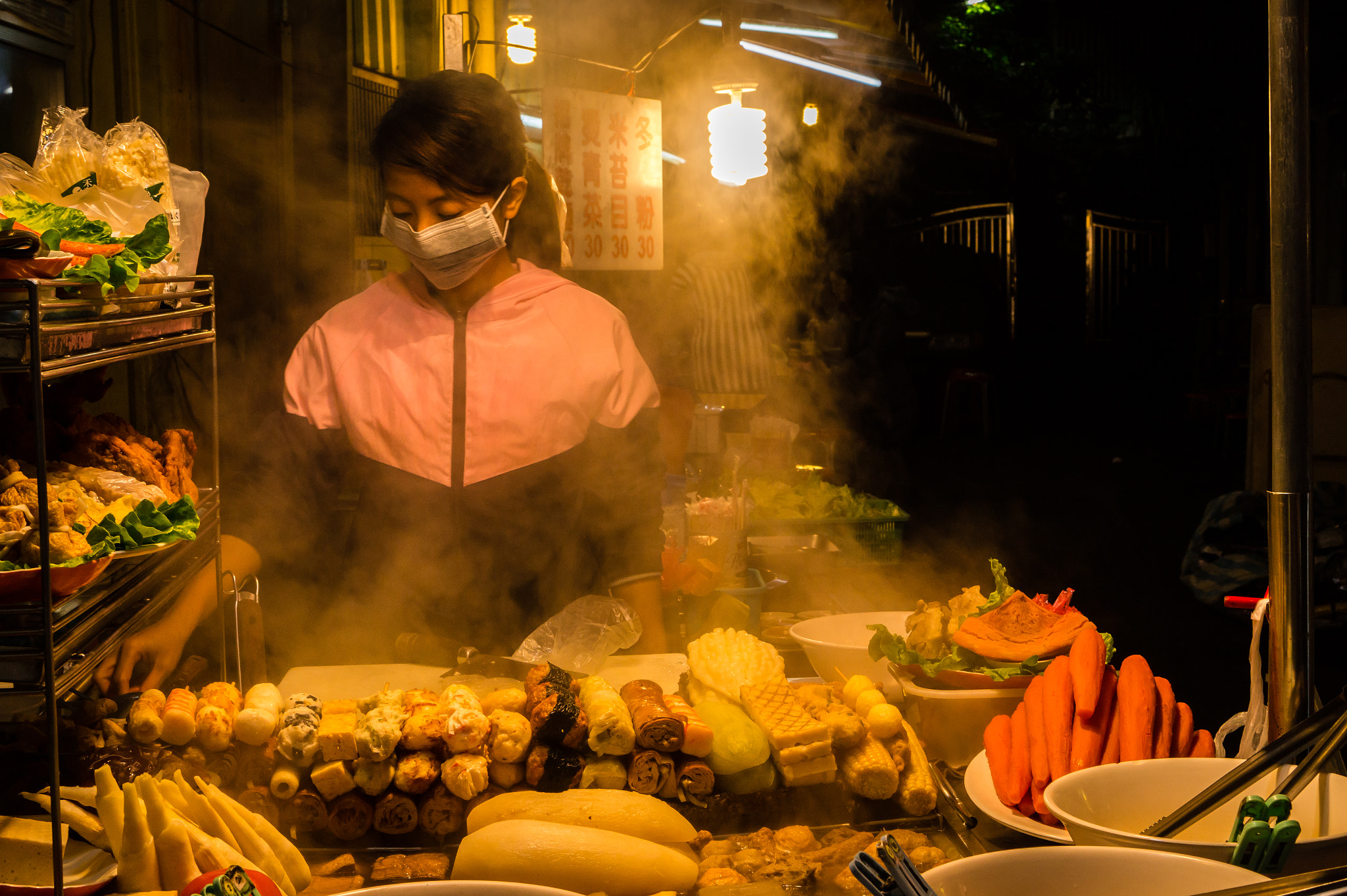 a foodstand at night