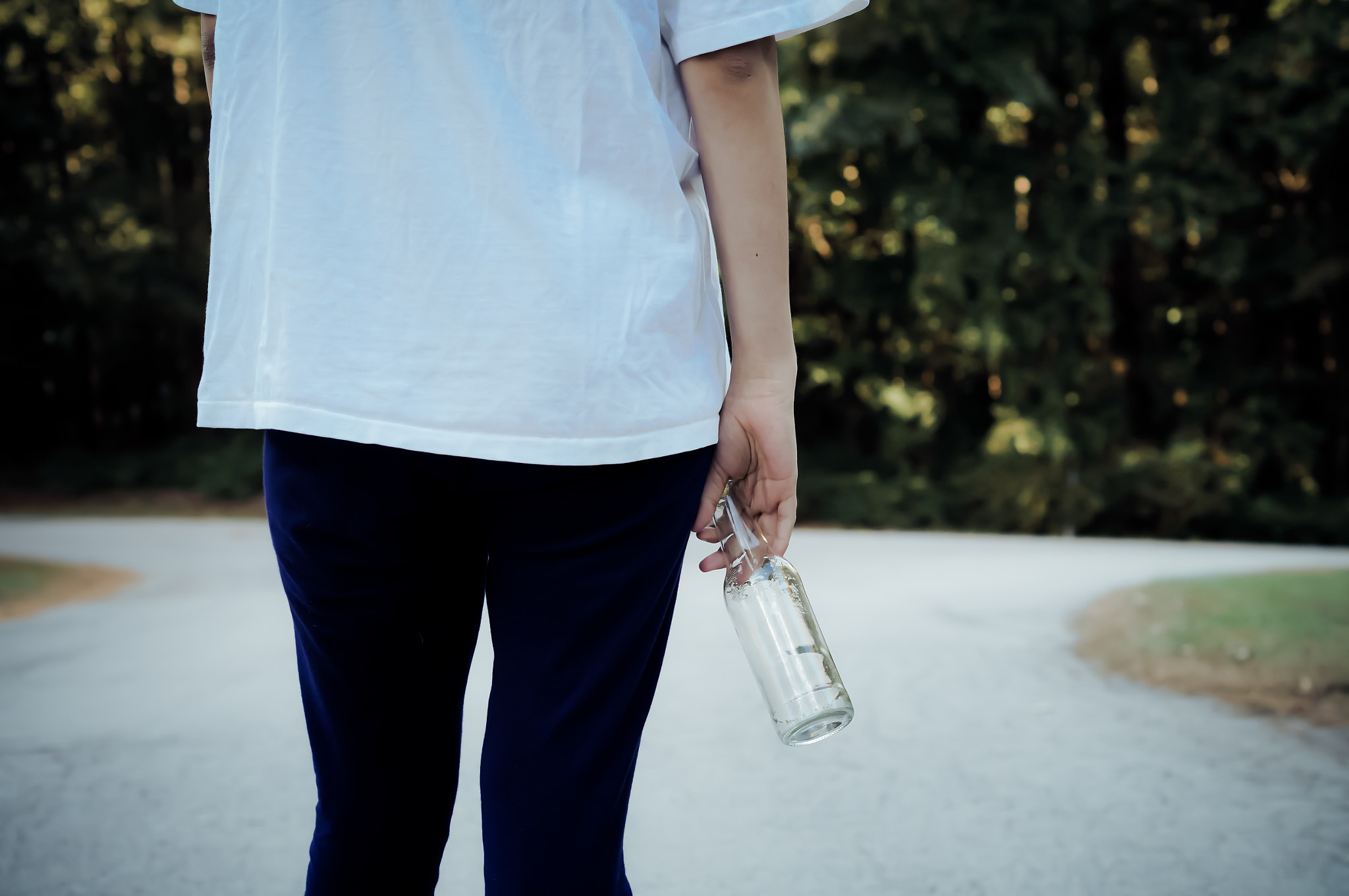 Teen girl with beer bottle